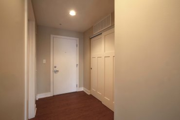 Entry to Studio apartment with abundant closet space.