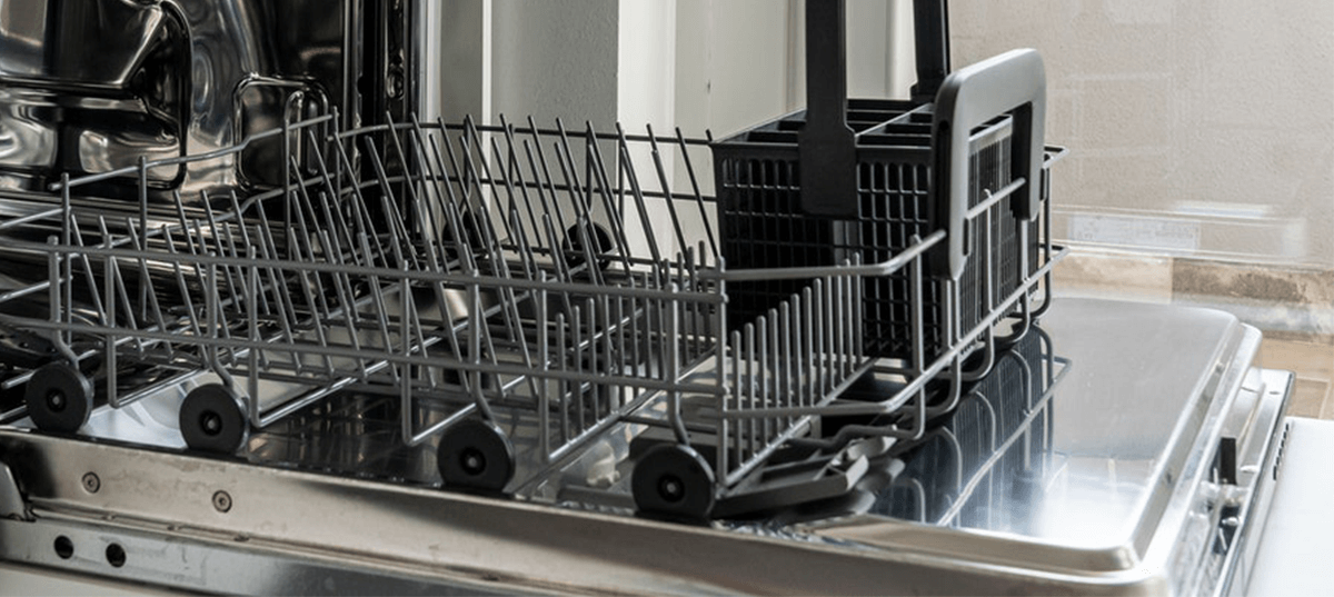 Photo of an open dishwasher. Image credit: Castorly Stock