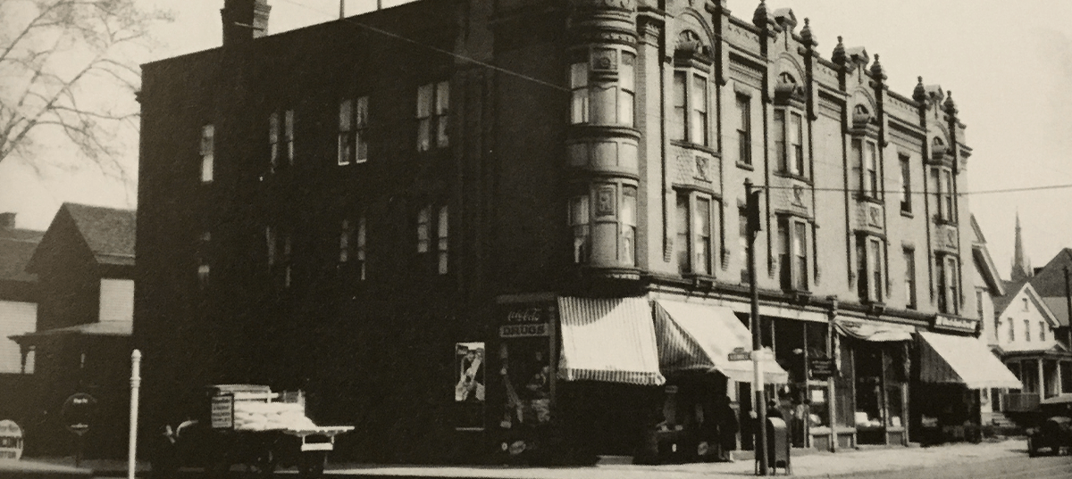 Photo of an apartment building built in 1885 at the corner of South Avenue and Alexander Street