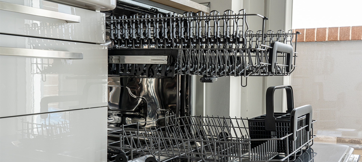 Dishwasher with both racks pulled out. Image credit: Casterly Stock