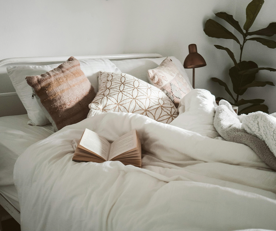 Bed with comforter and pillows