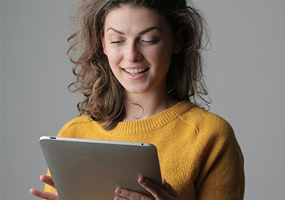 Woman reading on iPad