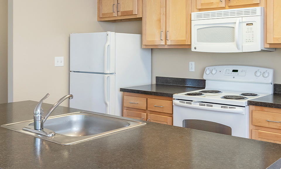 A kitchen island with sink